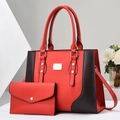 Detail of red and black tote bag set with textured synthetic leather and gold hardware - Red