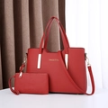 Red faux leather tote bag and pouch set with sweet gold logo and adjustable strap - Burgundy
