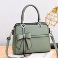 Chic light green crossbody bag with large bow and heart-shaped metal buckles - Green