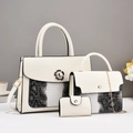 Detailed set of three beige handbags with snakeskin texture and camellia metal buckle - White