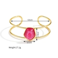 Detailed view of gold C-shaped cuff bracelet with pink stone and size specifications - Pink Irregular Stone (Style G)