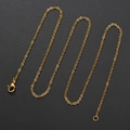Detail of 18k gold-plated 304 stainless steel cable chain with a lobster clasp closure - 1.2mm x 45cm / Gold