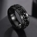 Detalle de anillo giratorio de acero inoxidable negro con cadena cubana texturizada - US 6 / Negro