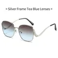 Silver metal sunglasses with brown-blue gradient lenses and diamond-studded curved temples - Silvery Frame Tea Blue Lens
