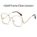 Sparkling gold metal frame oversized sunglasses with clear lenses and rhinestone details - Gold Frame White Lens
