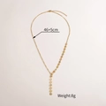 Dettaglio della collana a Y dorata con perle colorate, lunghezza 46+5cm e peso 8g - Stile di Giunzione a Disco Colorato a Forma di Y (N1771-D)