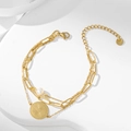 Pulsera de tres capas en acero chapado oro 14K con perla y colgante de sol radiante - Dorado