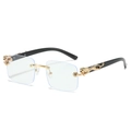 Lunettes de soleil sans monture avec relief de panthère dorée et branches noires - Monture dorée standard avec verres transparents