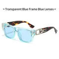 Lunettes de soleil oversize tendance avec monture bleue transparente et branches écaillées - Standard / Standard (incluant facture TVA 13 %) Monture bleue transparente avec verres bleus