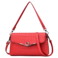 Minimalist bright red crossbody bag featuring crocodile texture and silver ring buckle - Red