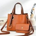 Brown litchi texture tote bag and matching clutch set with round metal ring decoration - Orange