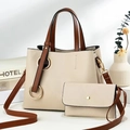 Beige lychee texture tote bag set with brown handles and large gold ring accent - Off White