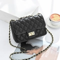 Classic black quilted leather crossbody bag with golden chain strap and swivel lock - Black