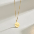 Collier doré avec pendentif médaille ronde gravée Good Luck et bordure festonnée - Doré