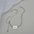 Collana di perle e catena d'argento stile punk con ciondolo a lametta e punta conica - Stile Perla Giuntata Argento