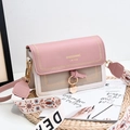 Pink and beige contrast crossbody bag with embroidered strap and metal ring charm - Pink
