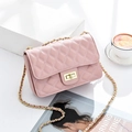 Quilted light pink chain crossbody bag with golden rectangular turn-lock closure - Pink