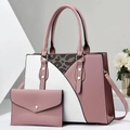 Detail of pink and white faux leather tote set with leopard print trim and gold studs - Pink