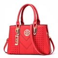 Red lychee pattern leather handbag with metal logo and diamond stitching detail - Red