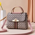 Taupe chain-link print crossbody bag with pink accents and classic tricolor webbing - Pink