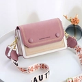 Detail of color-block crossbody bag featuring wide embroidered strap and matte texture - Purple
