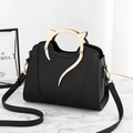 Minimalist black faux leather handbag with creative cat-shaped gold metal handles - Black