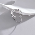 Verstelbare zilveren ring met halve maan en fonkelende zirkonia in een minimalistische stijl - Verstelbaar Open / Staalkleur