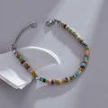 Kleurrijke kralenarmband van roestvrij staal met zilveren kralen en karabijnslot - Meerkleurig