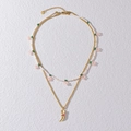 Double-layered stainless steel necklace with white beads and a red ruby tusk pendant - Pink Flower & Horn Pendant Style (N2039)