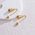 Macro view of teardrop gold earrings with streamlined mirror polished finish - Waterdrop Style (WLE073-shuidi)