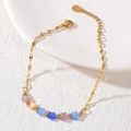 Golden chain bracelet with colorful cat-eye star beads and small gold spacers - Colorful Star