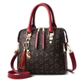 Women's dark coffee PU leather tote bag with red handles and gold cat pendant - Burgundy