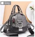 Grey soft leather backpack detail with rhinestone decor and chevron patterned strap - Gray