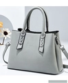 Light grey trapezoid handbag with decorative silver chain link hardware and crossbody strap - Light Gray