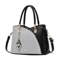 Women's black and white houndstooth patchwork tote bag with gold butterfly charm and strap - Lattice Contrast Black