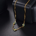 Golden necklace with wave bars and colorful beads on a black jewelry display box - Colorful Beaded Flower Wave Bar (M-WLN145)