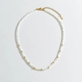 Bohemian style beige beaded necklace with shell luster and gold stainless steel accents - White & Gold
