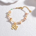 Bohemian beaded bracelet with gold flower charm and green shell beads for women - Gold Hollow Flower Style