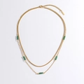 Collier double couche en acier inoxydable avec chaîne dorée et perles vert émeraude - Perles Vertes Double Couche