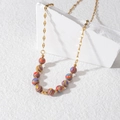 Minimalistische vergulde kralenketting met kleurrijke handgemaakte kleikralen met spiraal - Kleurrijke Macaron Kralen Ketting