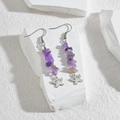 Macro shot of long drop earrings with purple crushed stones and silver butterfly charms - Purple Crushed Stone Butterfly Style (E619-zi-hd)