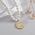French vintage pearl necklace with gold round pendant and sparkling heart design - White