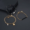 Set di tre braccialetti oro e nero con perle, conchiglie e catene a maglie classiche - Set di 4 (Oro/Nero/Bianco)