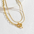 Collier double épaisseur en acier doré avec fermoir OT et chaîne serpent lisse - Collier à boucle OT double couche doré