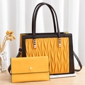 Fashionable yellow tote bag set with V-shaped texture and brown handles on wood surface - Yellow With Wallet