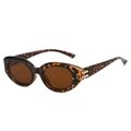 Occhiali da sole ovali vintage tartarugati con lenti marroni e dettagli dorati - Montatura Leopardata Lenti Marroni Sfumate