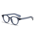Occhiali da sole retrò rotondi in resina blu scuro trasparente con rivetti argentati - Montatura Blu Trasparente Lenti Bianche