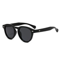 Gafas de sol redondas negras retro con remaches de flecha plateados y lentes oscuras, perfil - Régulier / Montura Negra Lentes Grises