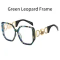 Occhiali poligonali chic in maculato blu-verde con dettagli delle aste dorati - Montatura Leopardata Verde