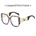 Montatura oversize alla moda tartarugata con cerniere decorative in metallo oro - Montatura Leopardata